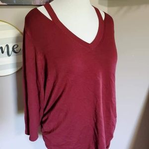 Maroon sweater with cutouts